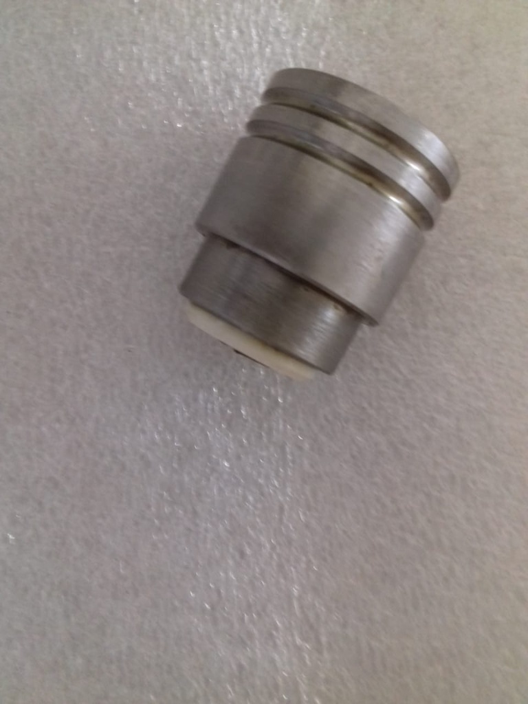 PISTON FOR MAGNETIC UNLOADER